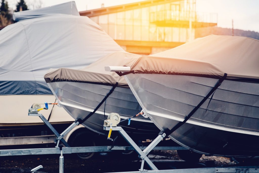boats covered in tarps